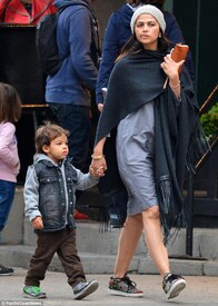 Off duty_ Camila Alves went make-up free while out with her son Livingston, three, in New York on Tuesday.jpg