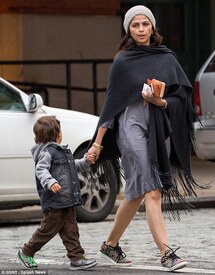 Make-up free_ She opted to go bare faced as she walked around with her son clinging tightly to her hand .jpg