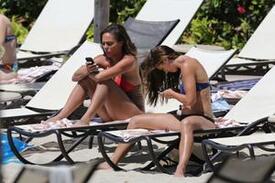 th_alex_morgan_and_sydney_leroux_in_bikinis_on_the_beach_in_hawaii_18.jpg