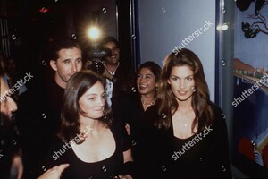 cindy-crawford-and-her-sister-with-william-baldwin-at-the-channel-fashion-party-2000-shutterstock-editorial-238880b.jpg