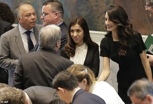 12619682-6951229-Amal_Clooney_right_and_Nadia_Murad_Basee_Taha_second_from_right_-a-57_1556035247634.jpg