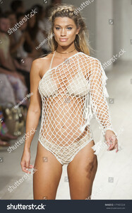 stock-photo-a-model-walks-the-runway-for-anna-kosturova-fashion-show-during-funkshion-swim-summer-on-july-477437224.jpg