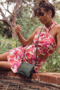 The-Wolf-Gang-Le-Jardin-Autumn-21-Audrey-Twist-Neck-Top-Magenta-Floral-Audrey-Mini-Skirt-Magenta-Floral-Magdala-Cross-Body-Bag-Amazon-2031.png