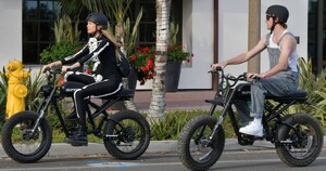 behati-prinsloo-riding-her-electric-bike-on-halloween-in-montecito-10-31-2022-0.jpg