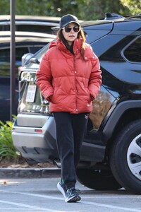 mila-kunis-wears-a-big-red-puffer-jacket-los-angeles-12-14-2022-6.jpg