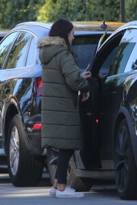 mila-kunis-wears-green-puffer-jacket-beverly-hills-01-17-2023-2.jpg