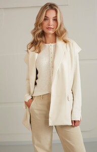 oversized-sleeveless-blazer-with-collar-and-pockets-ivory-white_1440x.jpg